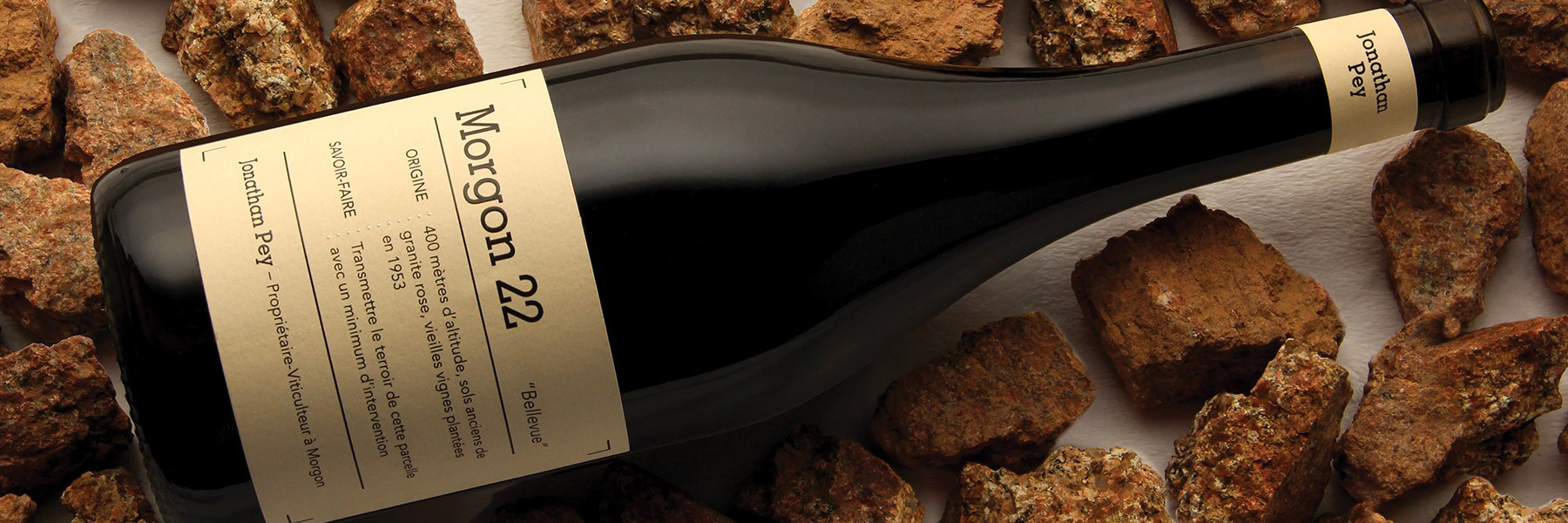 Morgon Cru wine on granite from vineyard